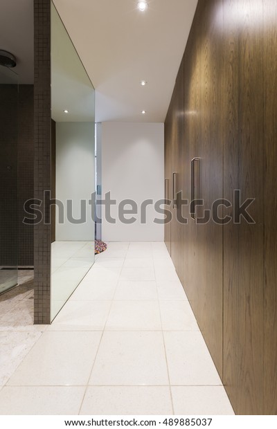 Huge Walk Through Wardrobe Walnut Doors Stock Photo Edit Now