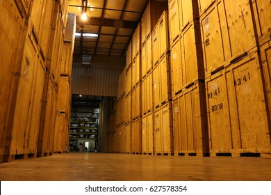 Huge Wall Of Wooden Crates In Warehouse