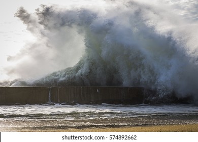 Huge Wave By The Ocean