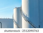 huge white silos in a silo farm with petrol