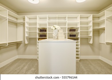 Huge White Walk-in Closet With Shelves, Drawers And Shoe Racks. Northwest, USA
