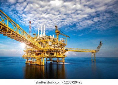 A huge yellow of offshore oil rig drilling platform in the gulf of Thailand,Process platform for production oil and gas,Petroleum production and exploration industrial