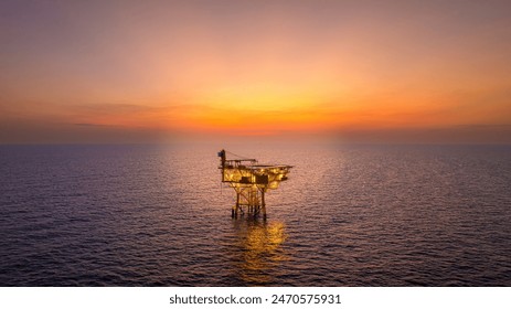 A huge yellow of offshore oil rig drilling platform in the gulf in sunset, Process platform for production oil and gas,Petroleum production and exploration industrial. RC8 Platform - Powered by Shutterstock