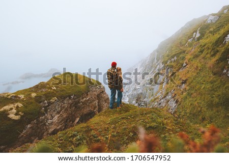 Similar – Image, Stock Photo Enjoy the view. Woman with headband, jacket. Ireland