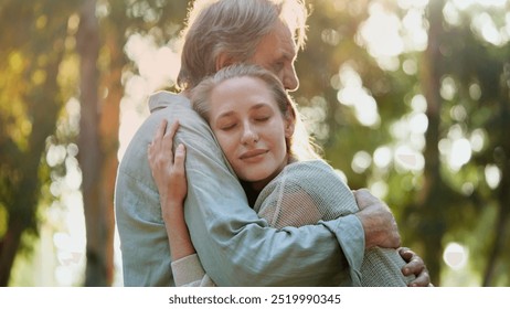 Hugging lovingly in the park                