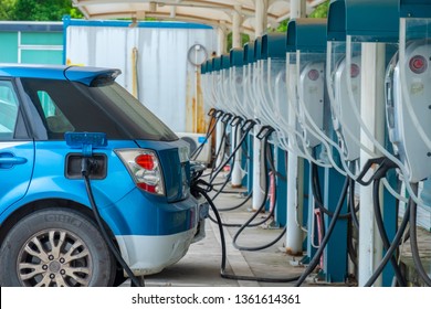 Huizhou, China - MAR 2019: The Charging Gun Of The Public Charging Pile Of The Electric Taxi Is Charging The Electric Vehicle.