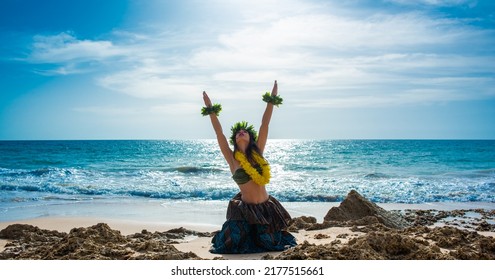 Hula dancer on the beach. Woman in bikini dancing Hawaiian typical of Tahiti. Tropical lady at beach with flower crown on her head and neck. Ready to party. Exotic girl in swimwear. Trend promo summer