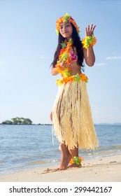 Hula Hawaii Dancer Dancing On The Sea Beach. Exotic Vacation On A Tropical Island..