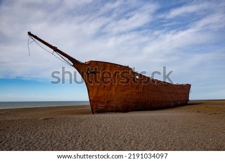 hull of an old ship burned on the seashore. The ship was called Marjorie Glen and it is in Punta Loyola