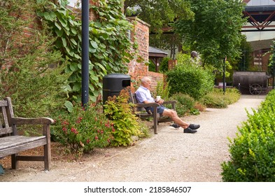 Hull, UK 07 30 2022 Man Relaxing In A Park