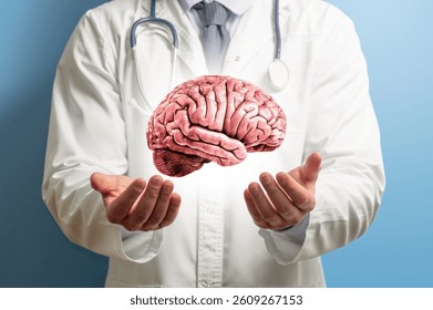 Human brain model over doctor’s hands.
