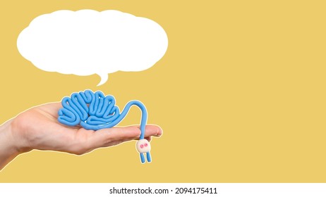 Human brain with a wire and a socket. Brain and bubble for text. Brain training. Maintaining mental health. Generating ideas. Improvement of mental activity. Collage with place for text. 