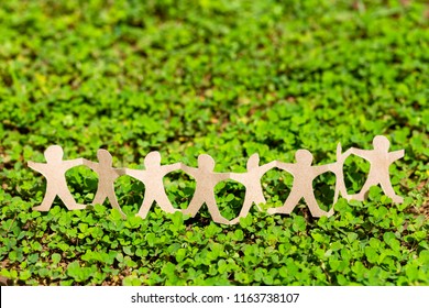 Human chain paper on green creeper plant, CSR (coporate social responsibility) or teamwork concept - Shutterstock ID 1163738107