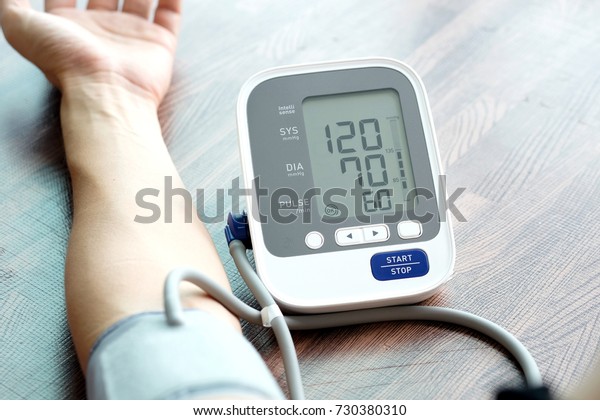 Human\
check blood pressure monitor and heart rate monitor with digital\
pressure gauge. Health care and  Medical\
concept