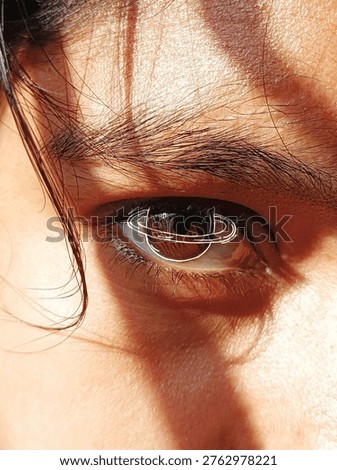 Human eye, brown iris, macro photography, eyelashes, eyebrow, pupil, skin texture, sunlight, white line art, planet drawing, Saturn rings.Close-up, high contrast, minimalist, surreal, graphic overlay, doodle art, artistic edit, modern,Macro close-up of a human brown eye with an artistic white line drawing of the planet Saturn and its rings on the iris in bright sunlight.🪐🪐