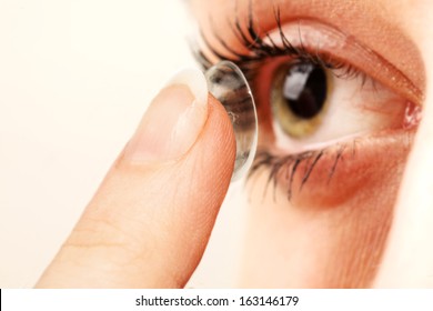 human eye and contact lens - Shutterstock ID 163146179