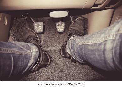 Human Feet Pressing Car Pedal