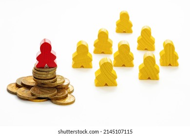 a human figurine stands on a pile of coins, the concept of financial success, wealth, social inequality - Powered by Shutterstock