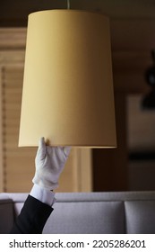 Human Finger Checking The Quality Hotel Worker Checking Dust Under Lamp.