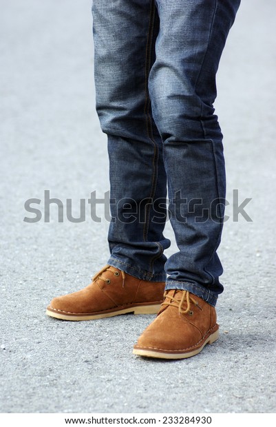 tan shoes and jeans
