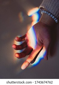 Human hand capturing the light
