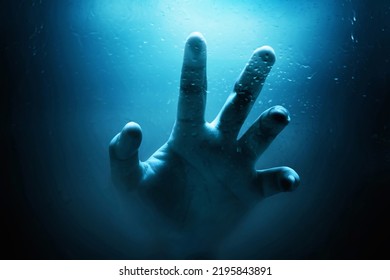 Human hand drowning, Halloween theme