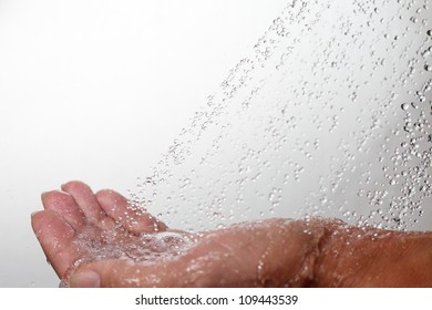 Human Hand And Falling Water.