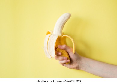 Human Hand Holding Banana Fruit Nutrition Concept