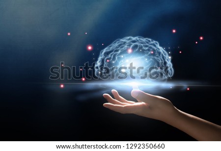 human hand holding brain, Artificial Intelligence, AI Technology, thinking concept.