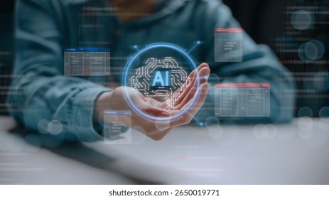 Human hand holding digital brain icon labeled AI with holographic programming windows. Concept of artificial intelligence development, human-machine collaboration, and smart coding.