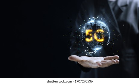 Human hand holding earth 5G globe holographic technology . Futuristic visualization for virtual reality and augmented reality . Empty space for your text. - Powered by Shutterstock - Get 15% off with code: PIKWIZARD15
