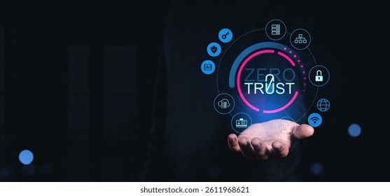 Human hand holding glowing zero trust cybersecurity icons in creative digital style on dark background, representing secure network access control