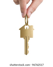 Human Hand Holding Key To A Dream House Isolated On White