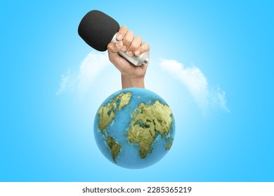 Human hand holding a microphone. World press freedom day concept