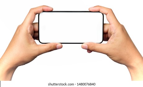 Human hand holding a virtual cell phone is playing game or watching movie on screen, isolated on white background. - Shutterstock ID 1480076840