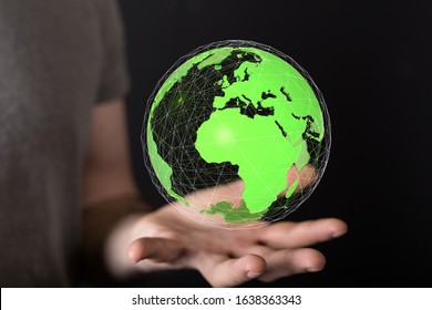 Human Hand Holding The World In Hands - Shutterstock ID 1638363343