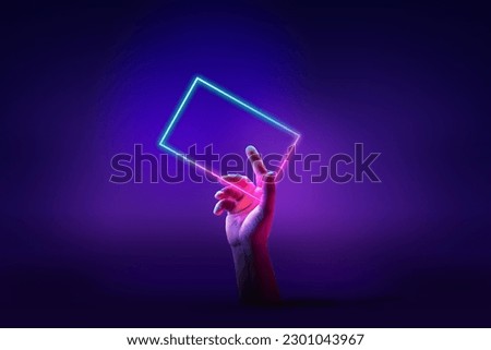 Human hand interacting with geometric glowing figure, rectangle over abstract minimal violet background in neon light. Concept of ultraviolet light, fashion, virtual reality, technologies, ad