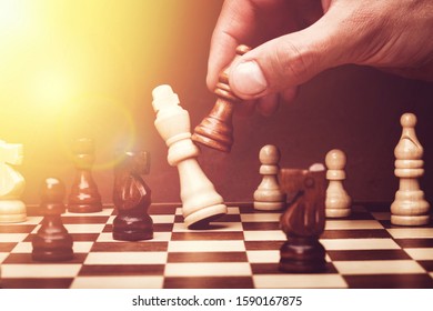 Human Hand Playing Chess, Buisness Strategy Concept