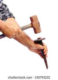 Human Hand Working With Chisel Tool And Hammer