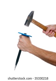 Human Hand Working With Chisel Tool And Hammer