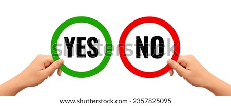 Human hands holding Yes and No signs isolated on white background