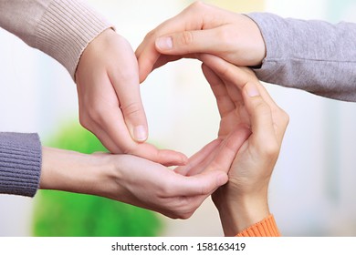 Human Hands Making Circle On Bright Background