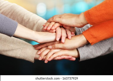 Human hands on bright background - Shutterstock ID 163737929