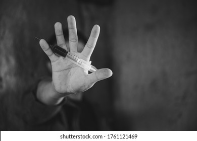  Human hands on dark background, Stop drug addiction concept, Do not interfere with drugs,  International Day against Drug Abuse.