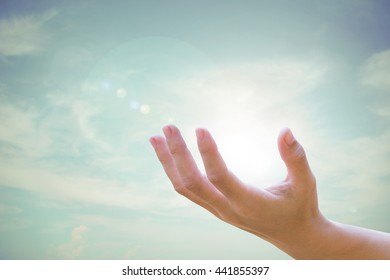 Human hands open up Natural blurred of the background sky.Environment Day concept. Ecology 