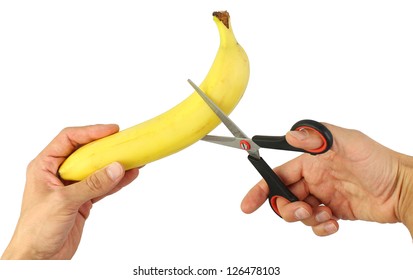 Human Hands Try To Cut Banana By Scissors