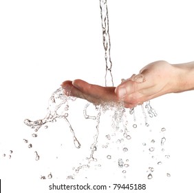 human hands with water splashing on them - Shutterstock ID 79445188