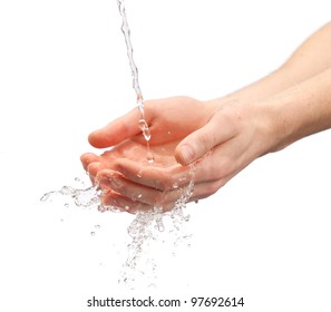 human hands with water splashing on them - Shutterstock ID 97692614