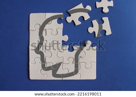 Human head on incomplete puzzles. Dementia, memory loss, mental health and Alzheimer concept