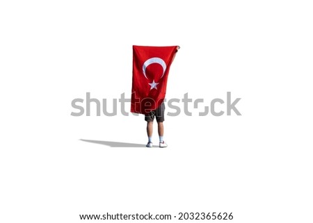 Human holding Turkish flag on isolated white background